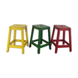 Three wooden stools with a handle