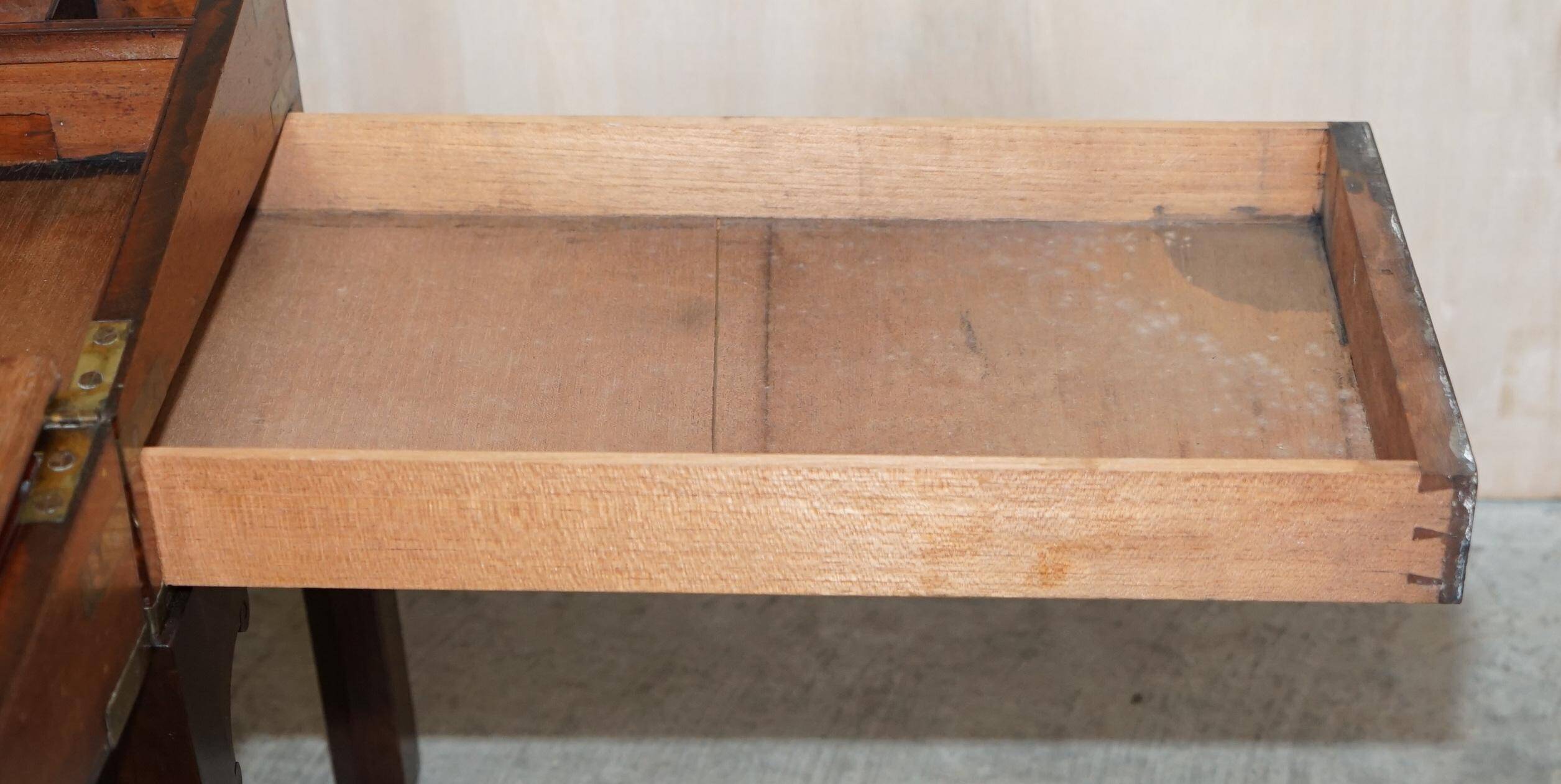 Antique hardwood military campaign desk with writing slope.