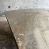 Light gray solid granite coffee table with organic triangular shape and conical base, 1980s