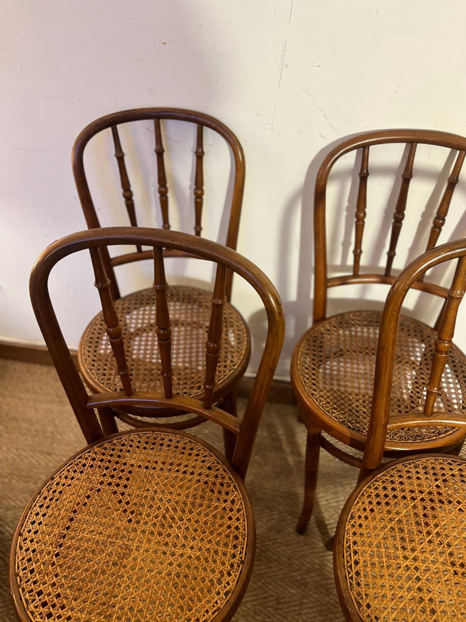 Set of 4 vintage Fischel bistro chairs in curved wood and cane