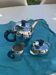 Coffee service consisting of three pieces in chrome and bakelite vintage