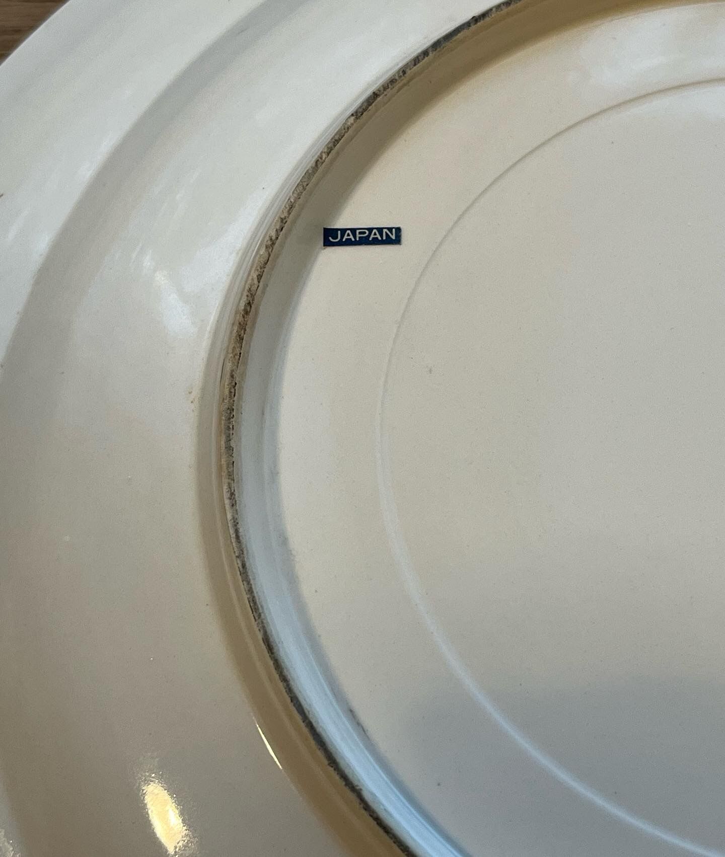 Japanese earthenware dish with peacock motif