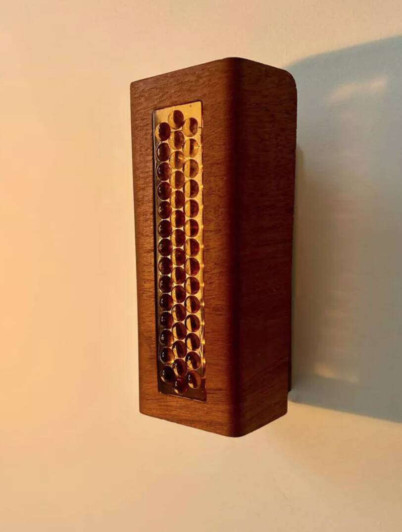 Pair of vintage wall lights, teak and amber glass, Sweden 1960