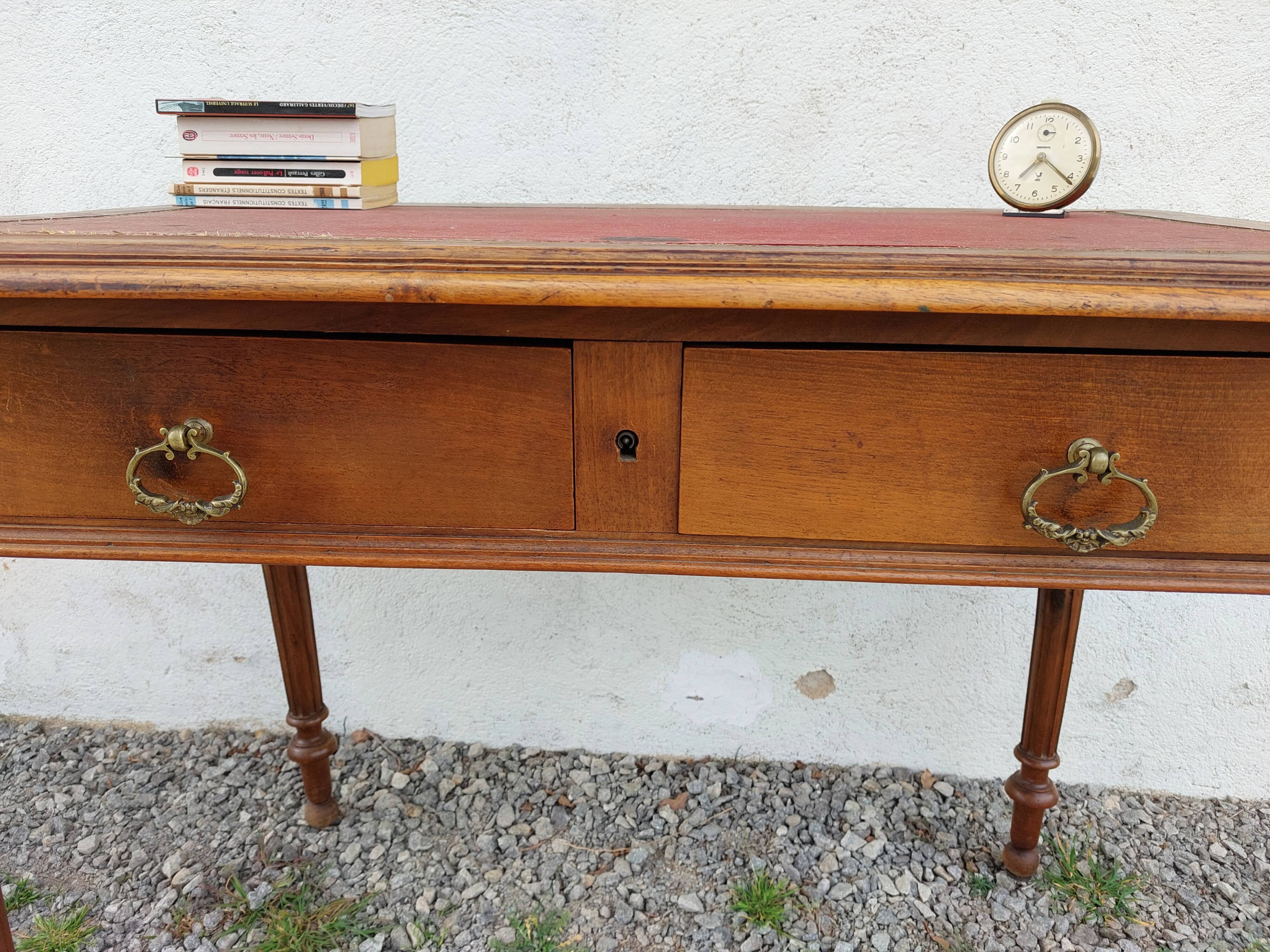 Old wooden desk, red felt top