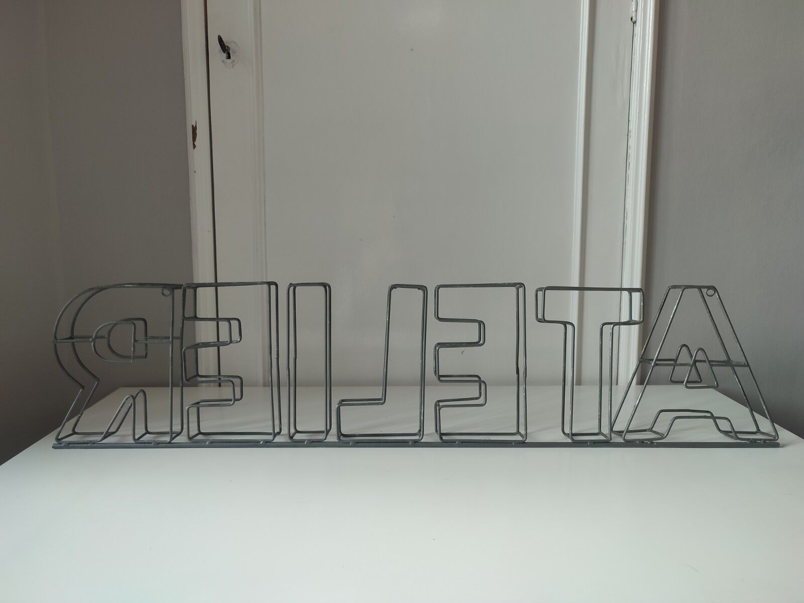 Zinc workshop sign