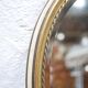 Old oval mirror Louis XVI style in gilded wood 50cm x 34cm