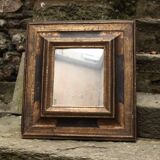 Miroir ancien en bois doré