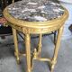 guéridon rond en bois doré, de style Louis XVI
