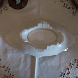 Old footed dish in slipware