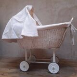 Wicker and painted wood baby cradle