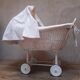 Wicker and painted wood baby cradle