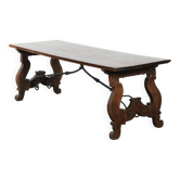 Table à manger espagnole antique du XVIIIe siècle avec une base en fer forgé.