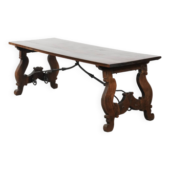 Antique 18th-century Spanish dining table with a wrought iron base