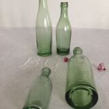 Set of 4 old thick glass bottles