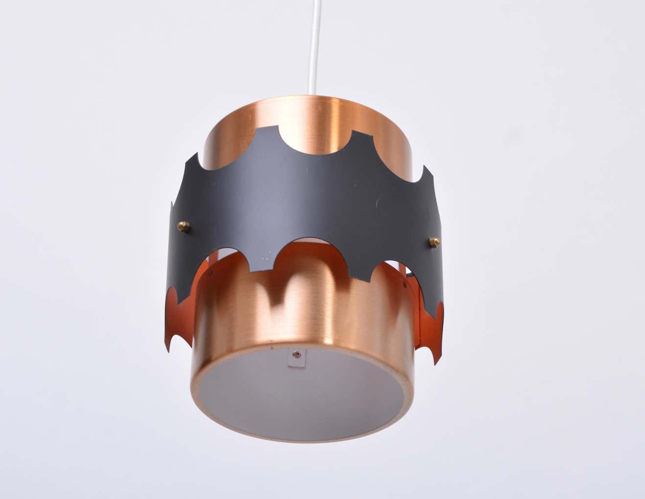 Set of two mid-century copper-colored German pendant lamps
