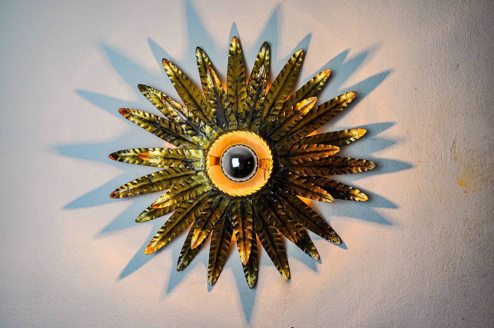 Sun wall lamp by Ferro Arte, metal and gold leaf, Spain 1970