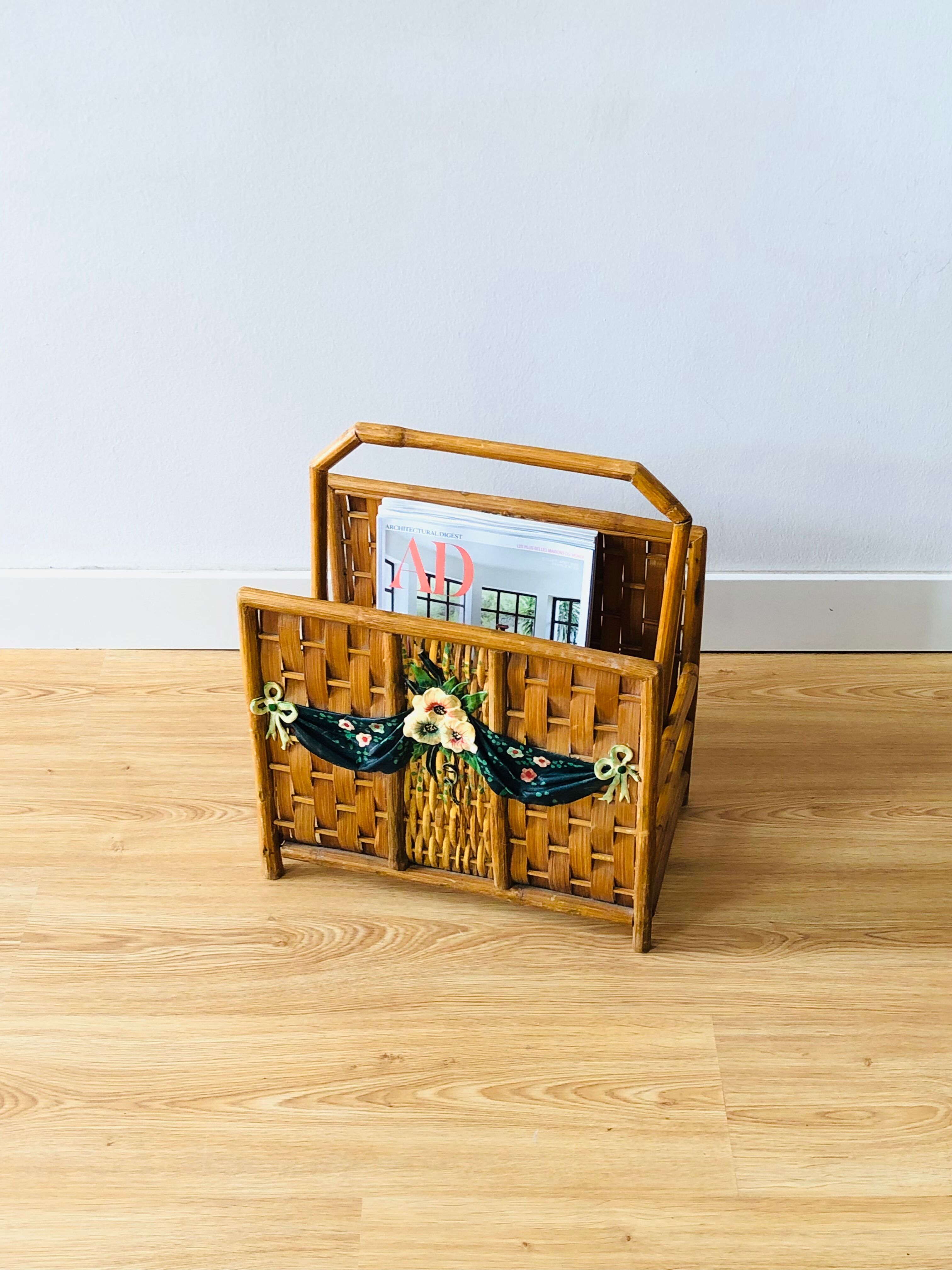 Vintage rattan magazine holder with floral decoration