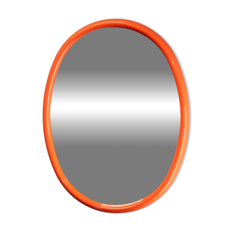 1970s Italian oval mirror in orange plastic frame