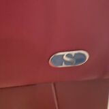 RED LEATHER ARMCHAIRS signed “SEDE”