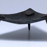 Brutalist metal pocket with patinated tripod