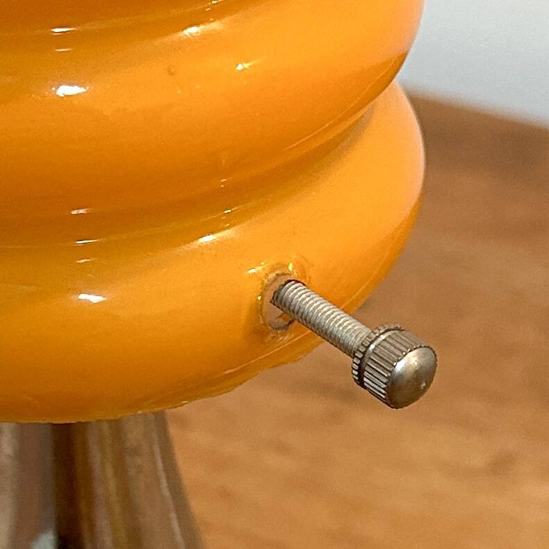 Vintage orange lamp with chrome tulip base and glass shade