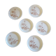 6 plates in light sandstone
