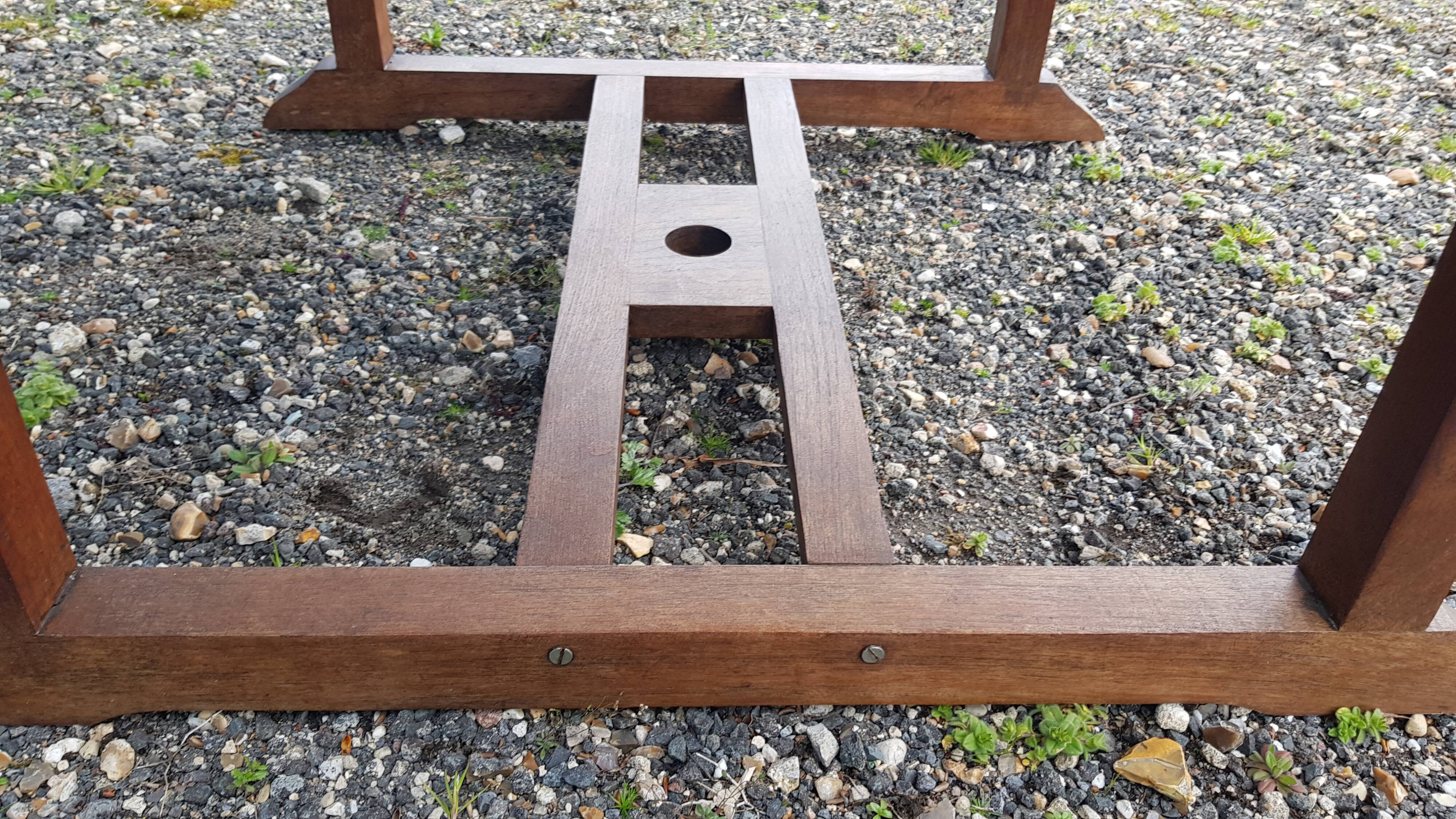 Stretchable garden dining table in solid teak