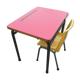 Child desk and vintage schoolboy chair
