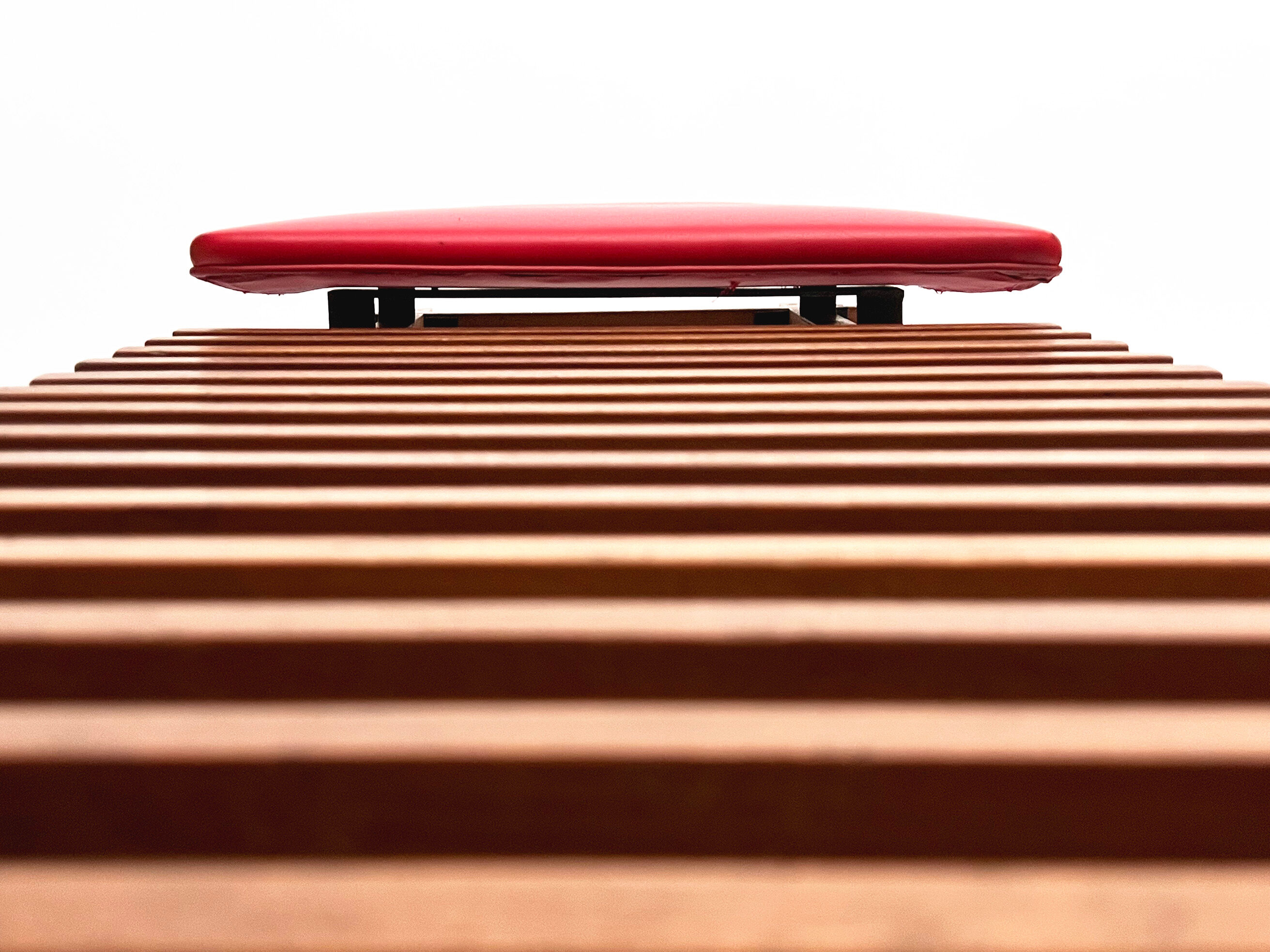 Teak bench designed by Inge and Luciano Rubino for APEC