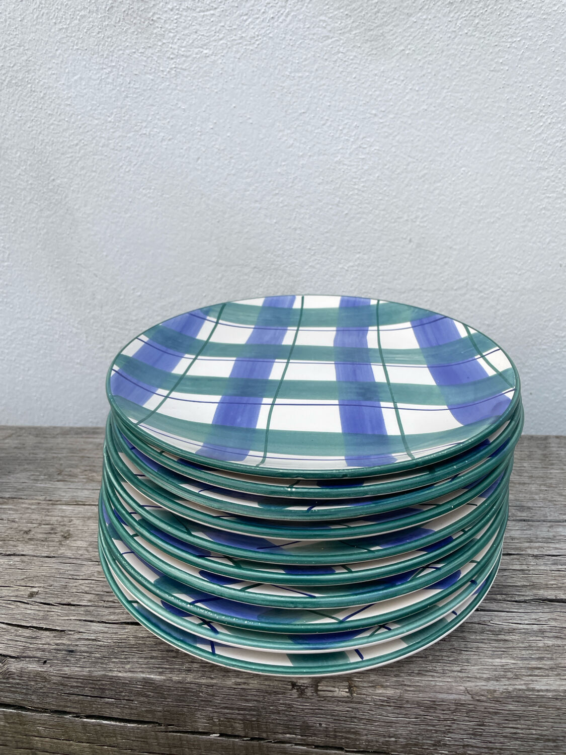 10 blue and green checked ceramic plates