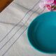 Tablecloth, ecru, blue/green stitching