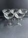 5 blown glass champagne glasses with cut bee decoration