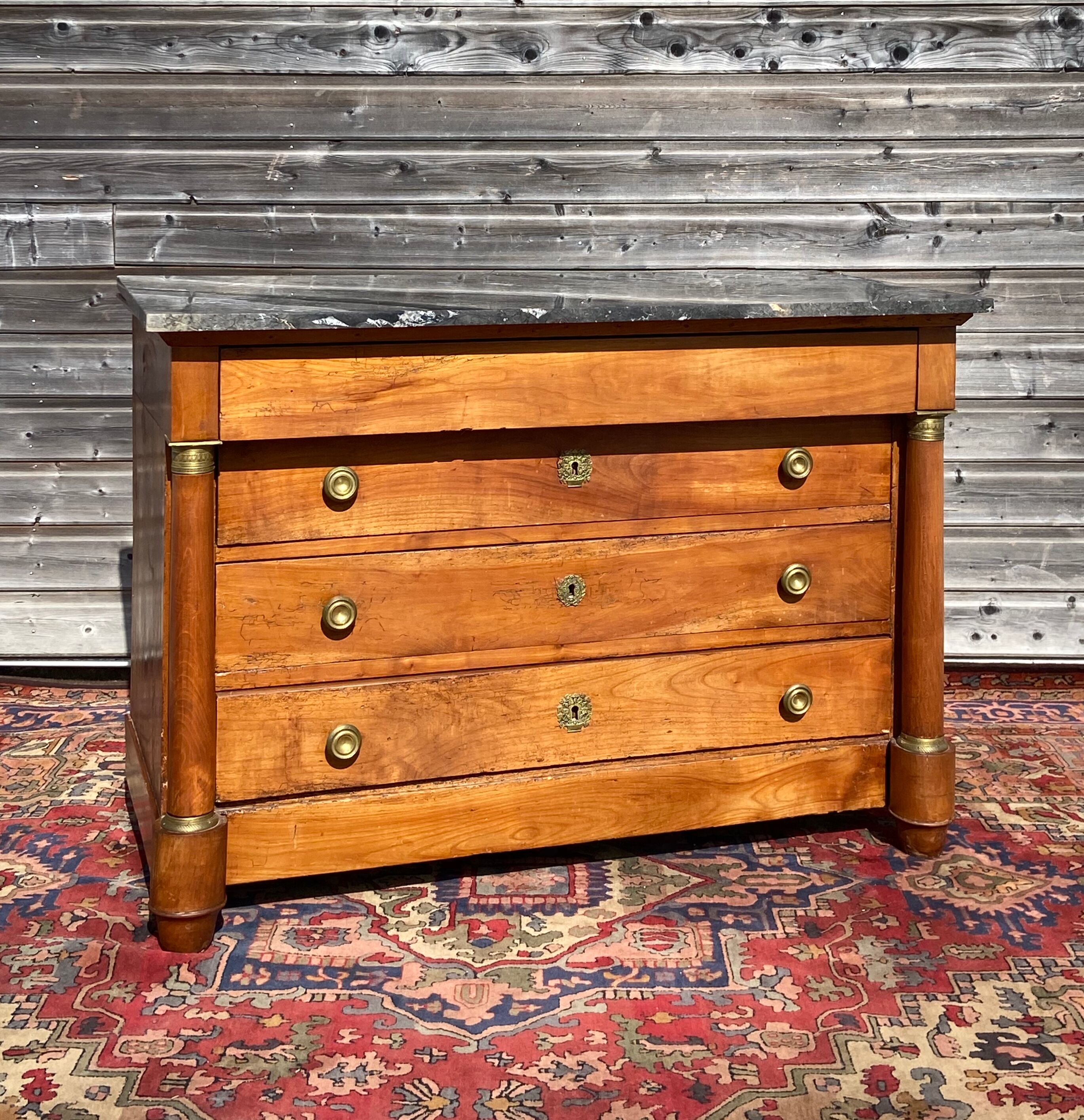 Chest of drawers of the period empire in cherry