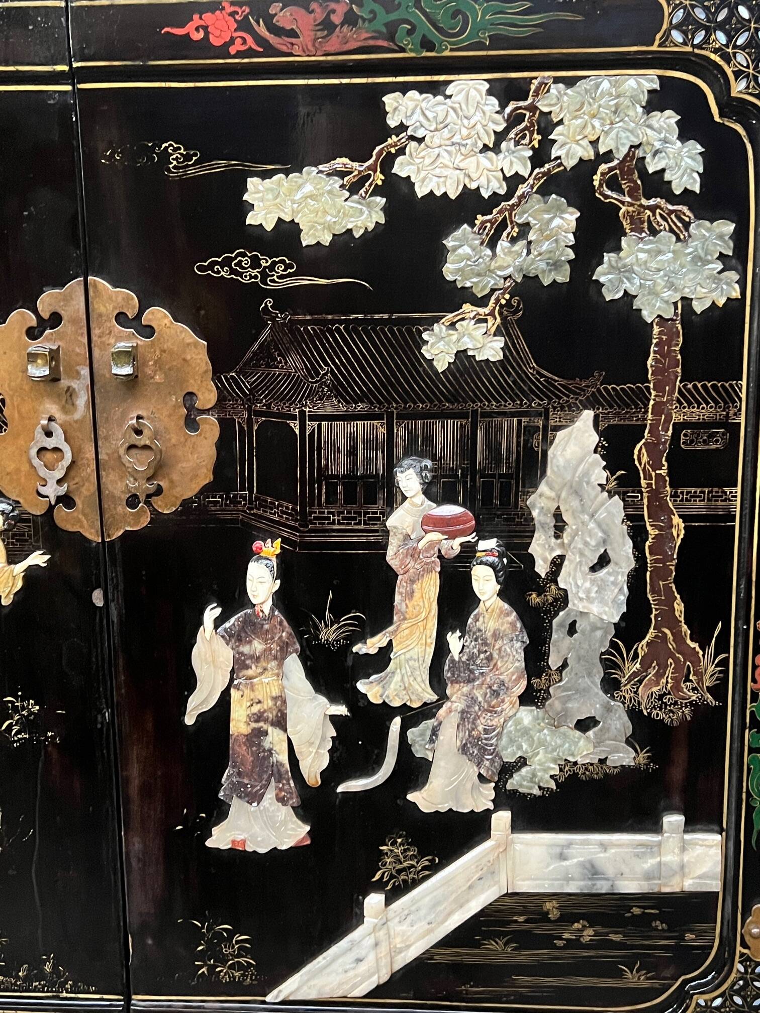 Chinoiserie-style cabinet. Inlaid with steatite, jade, marble, and ivory.