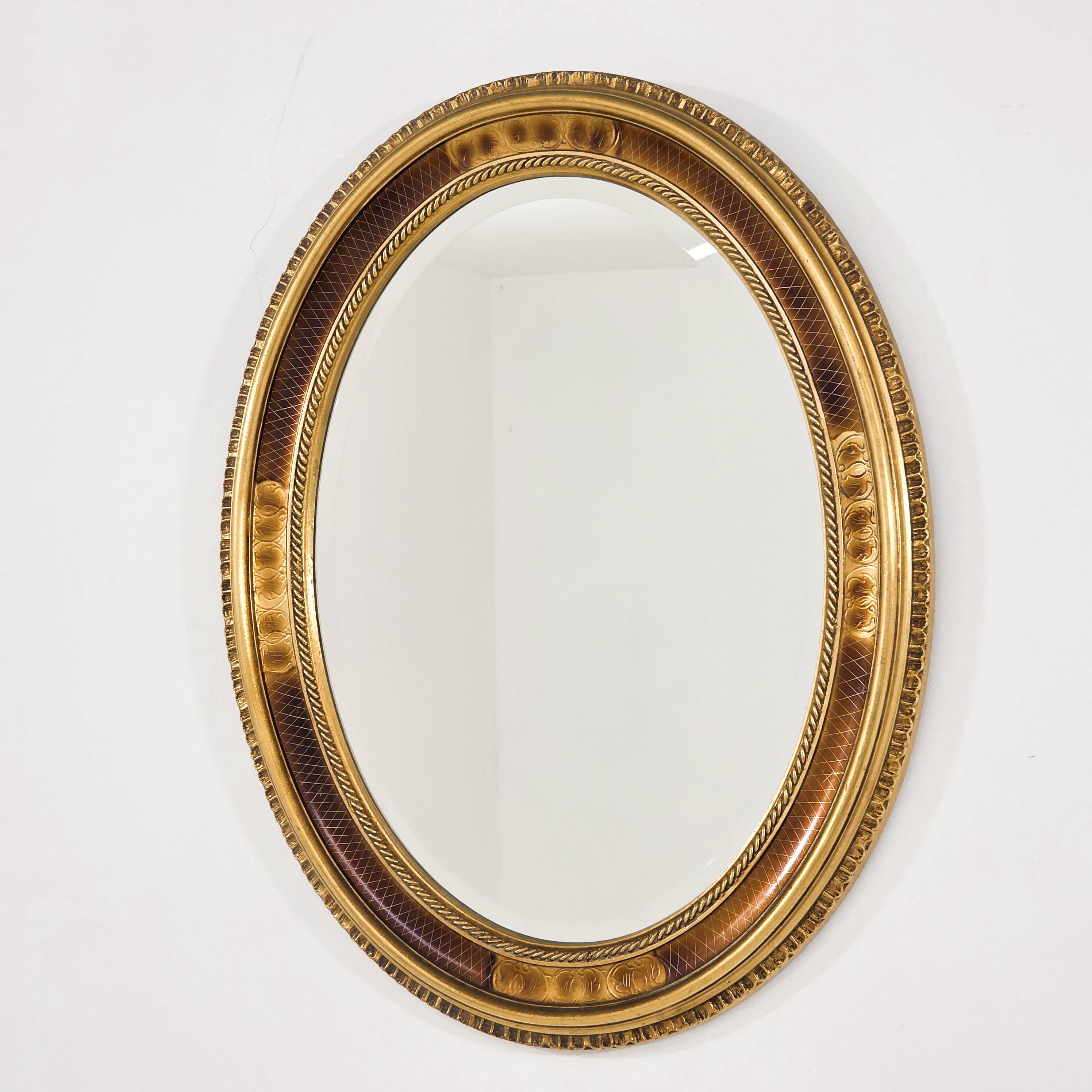 Paire de miroirs médaillon de style Louis XV