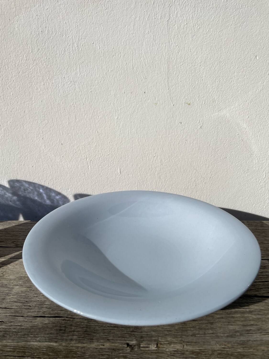 Round dish, sky blue ceramic wolf mill