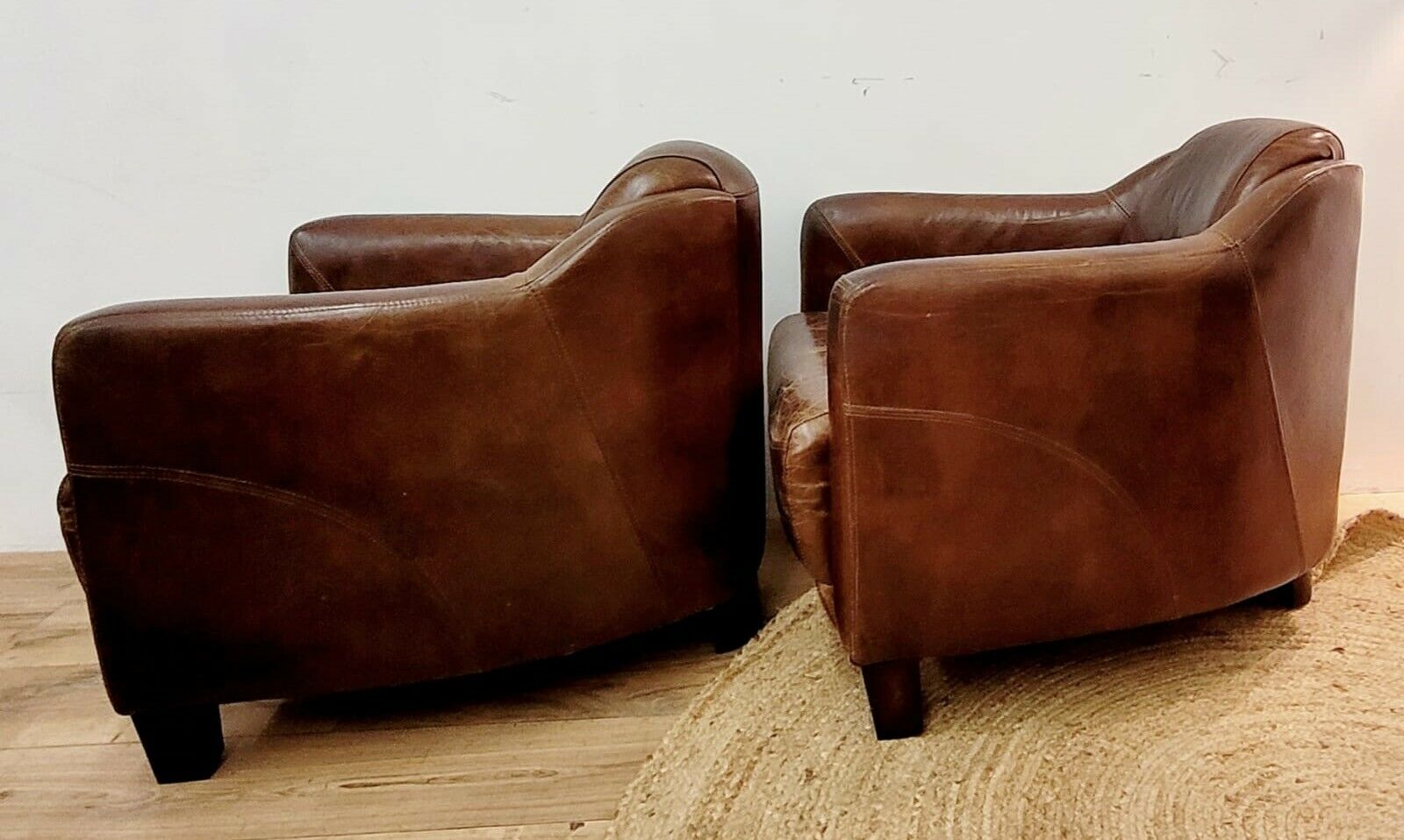 Pairs of vintage leather club armchairs