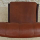 Chic Vintage Chesterfield style chair with wooden frame and faux leather