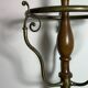Umbrella stand and English-style wooden and brass canes, 20th century.