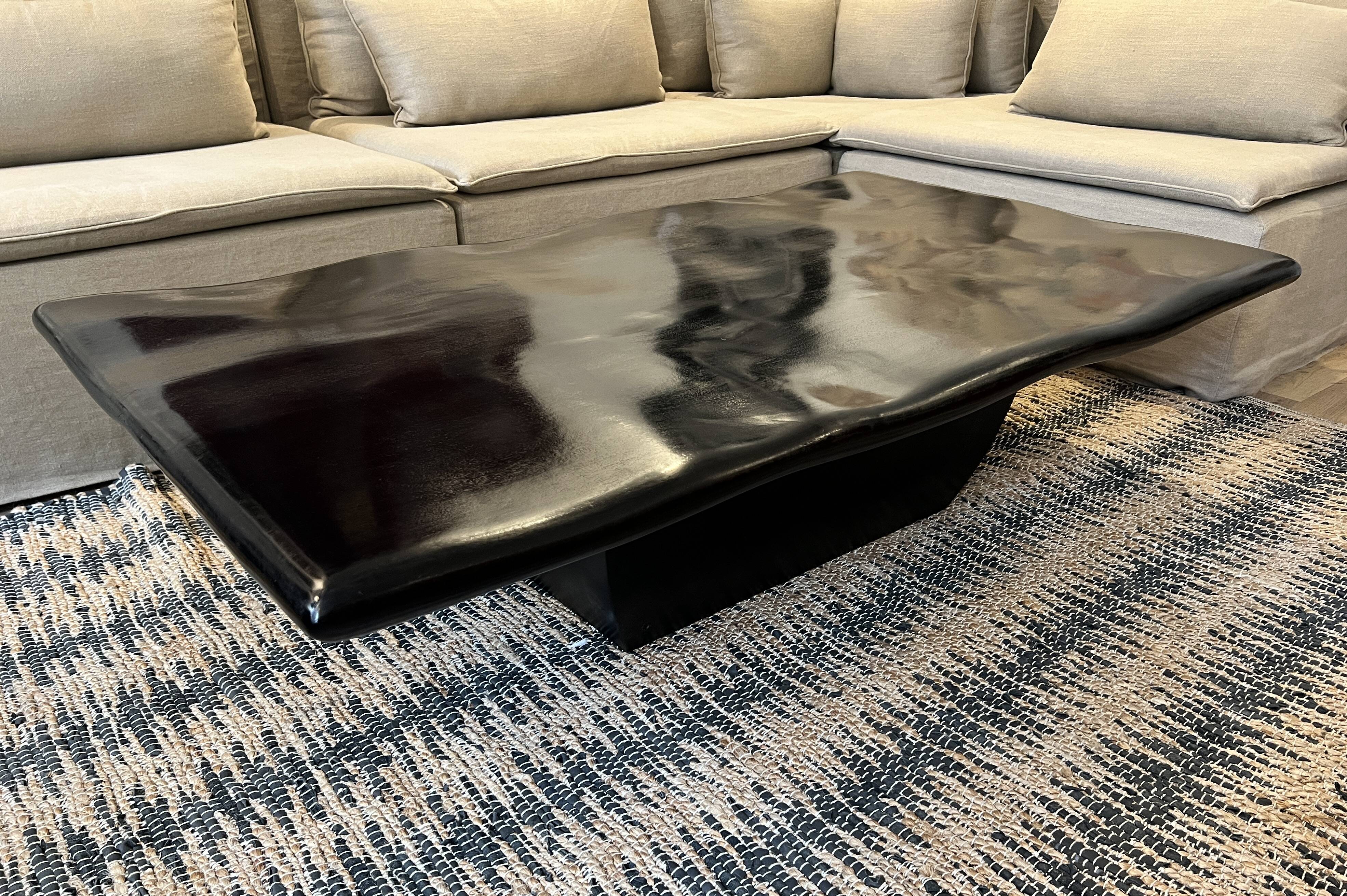 Mango wood coffee table, "wave effect" top.