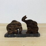 Vintage palm wood elephant salt and pepper shakers.