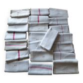 Lot 22 old linen tea towels with various battens