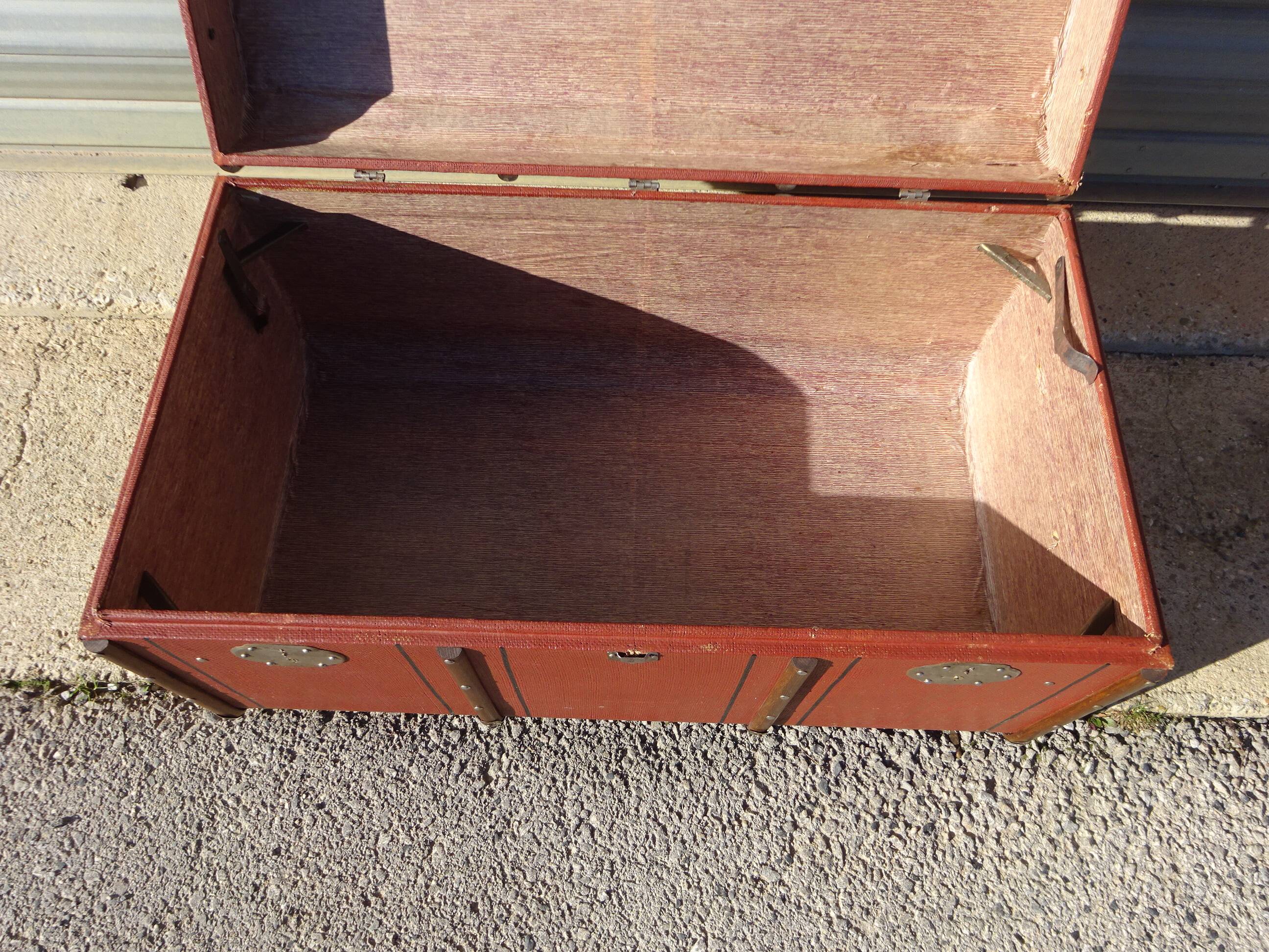 Old curved travel trunk