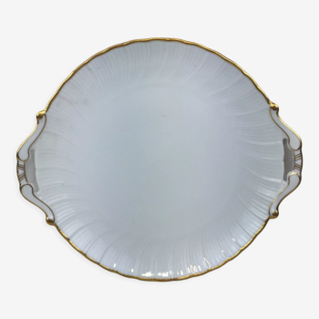 Round dish of a pure white with its handles, made in france Porcelaine Limoges