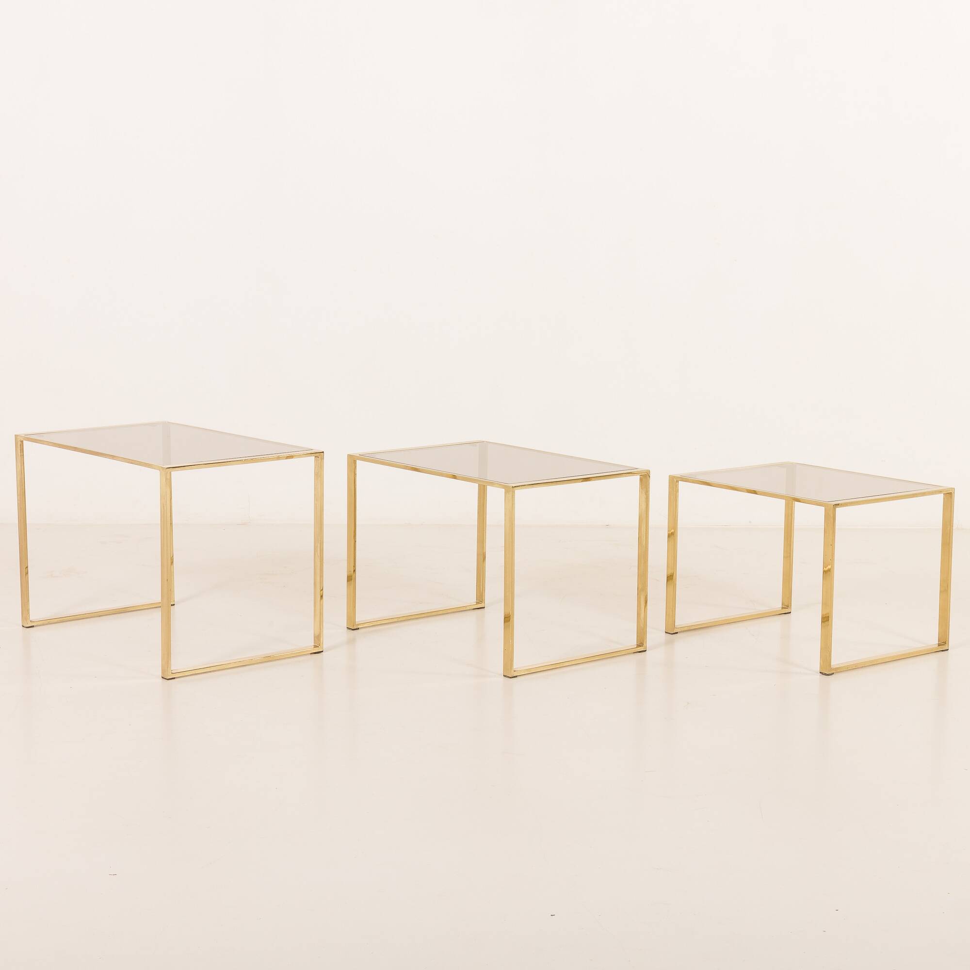 Set of three brass nesting tables in the style of Romeo Rega, Italy, 1970s