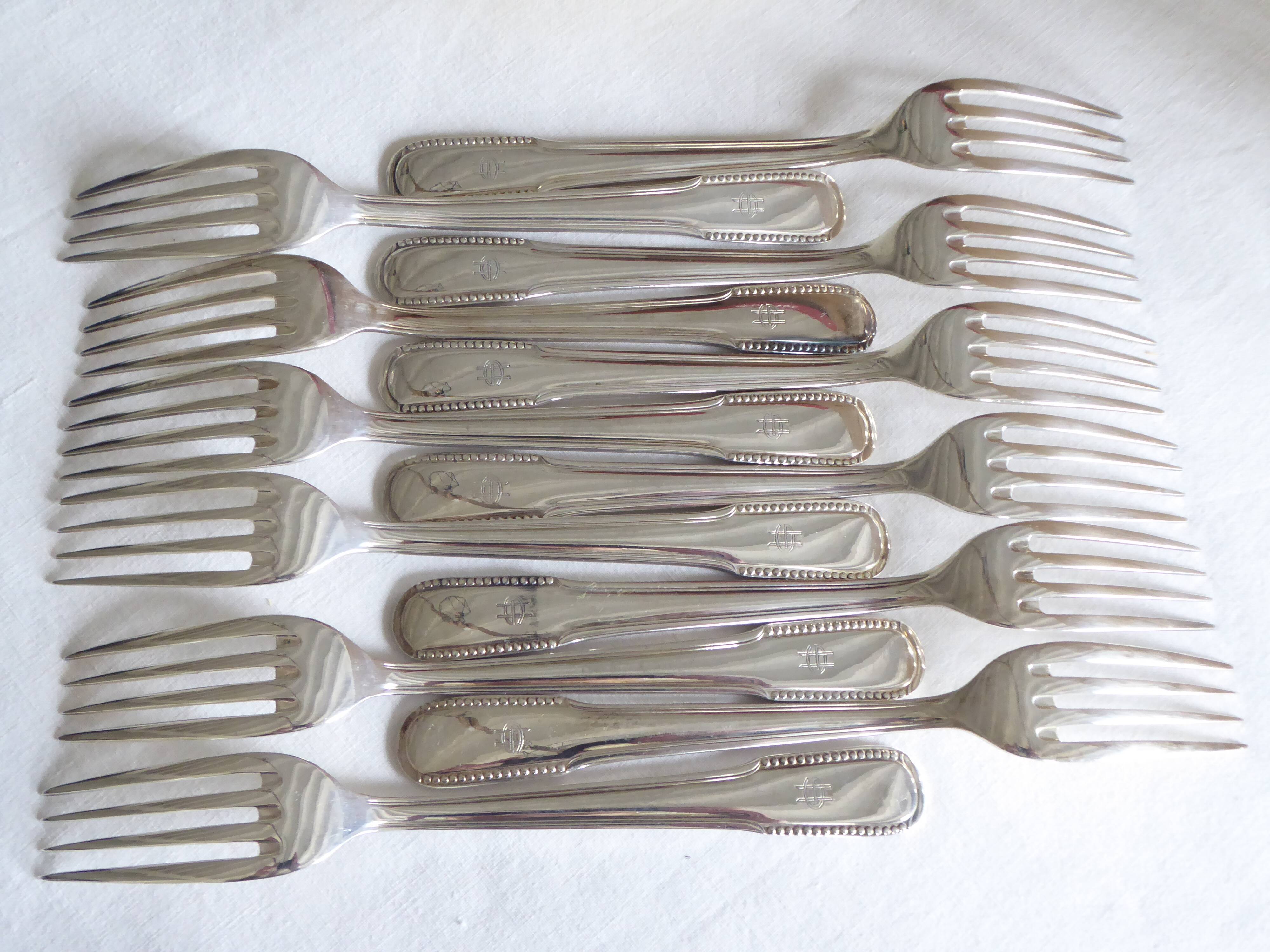 12 dessert forks, silver metal