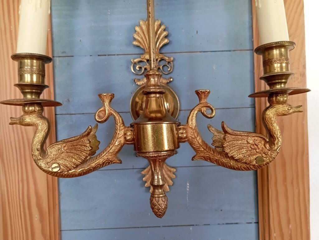 Pair of bronze and sheet metal hot water bottle wall lights