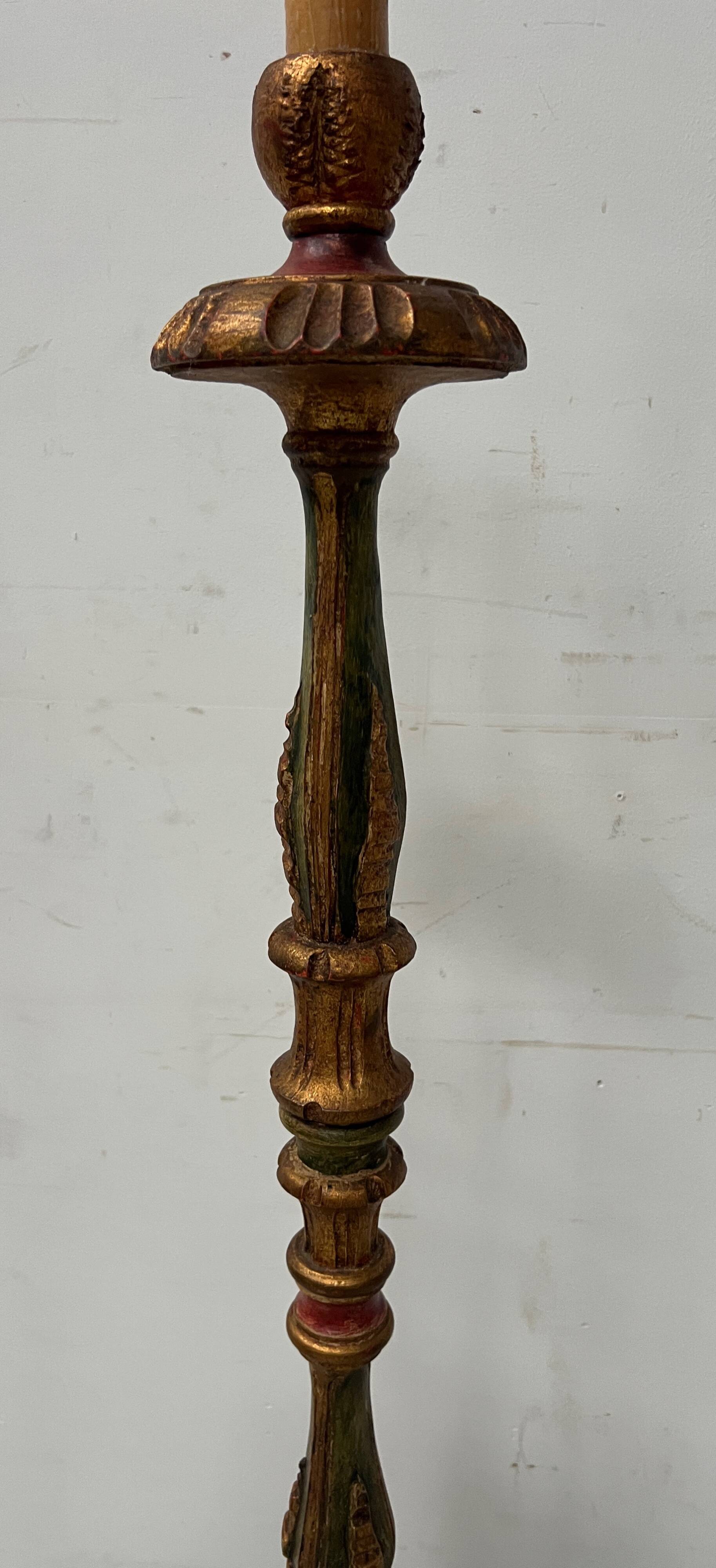 Polychrome carved wooden floor lamp, 20th century.
