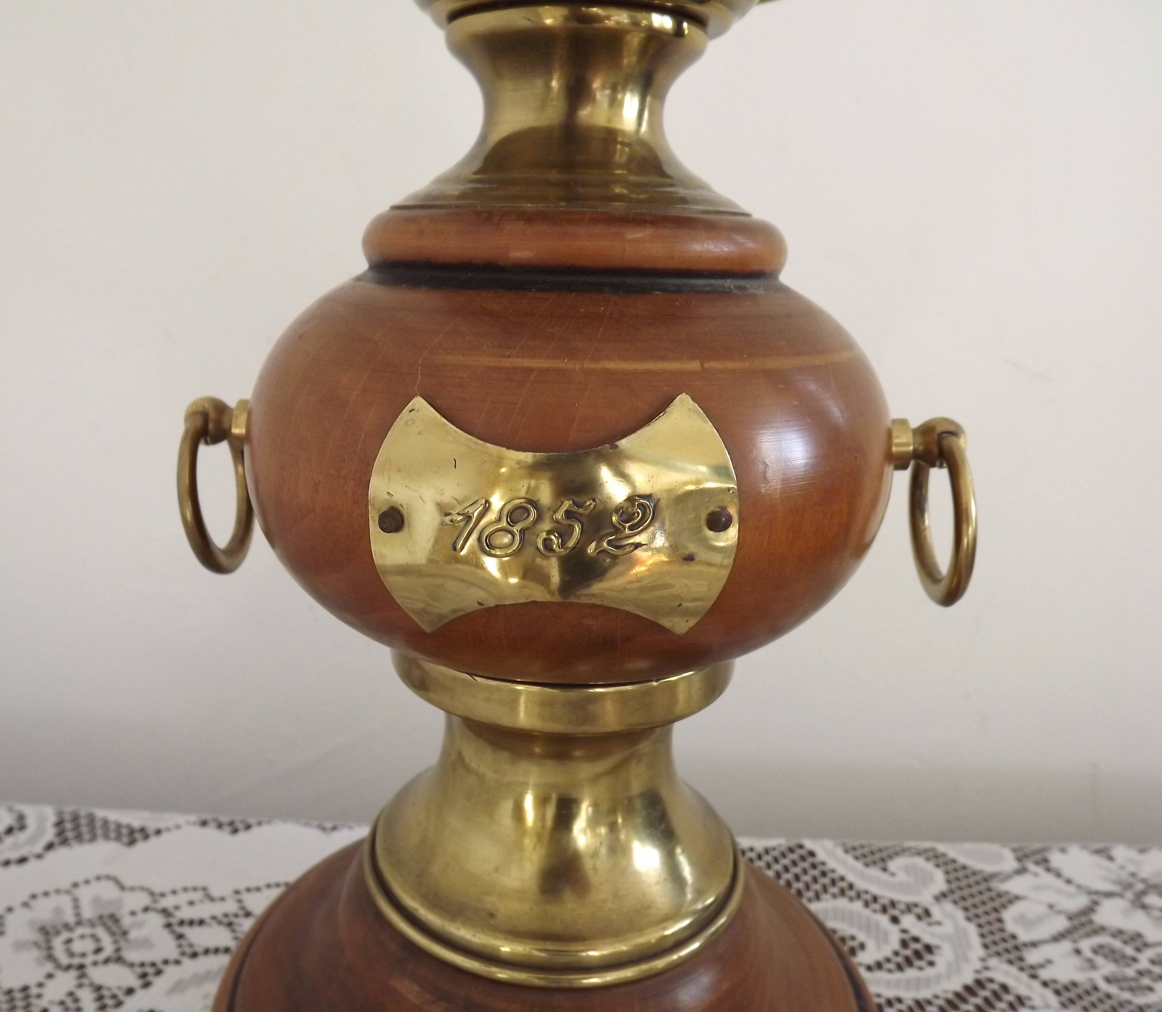 Turned wooden floor lamp with label and golden handles 1852