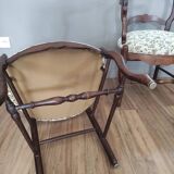 Pair of Provencal armchairs in brown wood and floral fabric